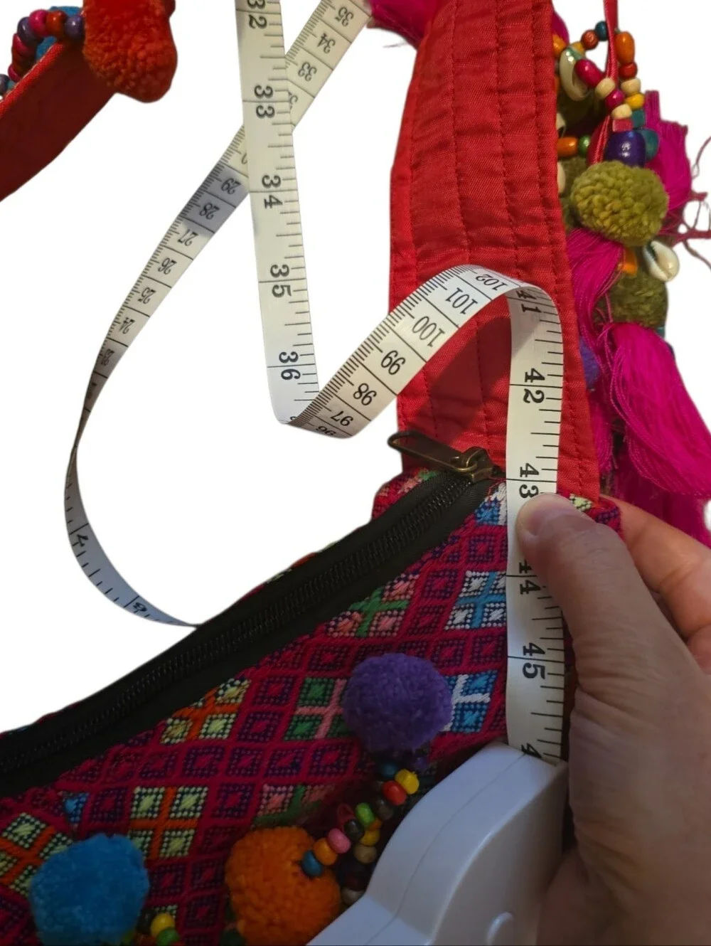 Colorful, handcrafted bohemian shoulder bag with traditional woven details